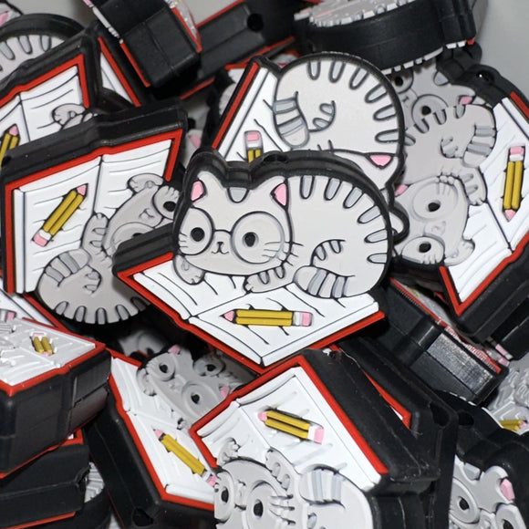 219 Cat Laying on Book 2ct